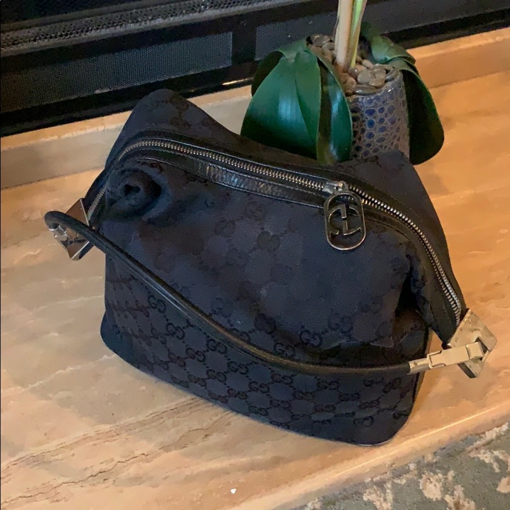 Gucci hobo bag with large GG’s silver zipper